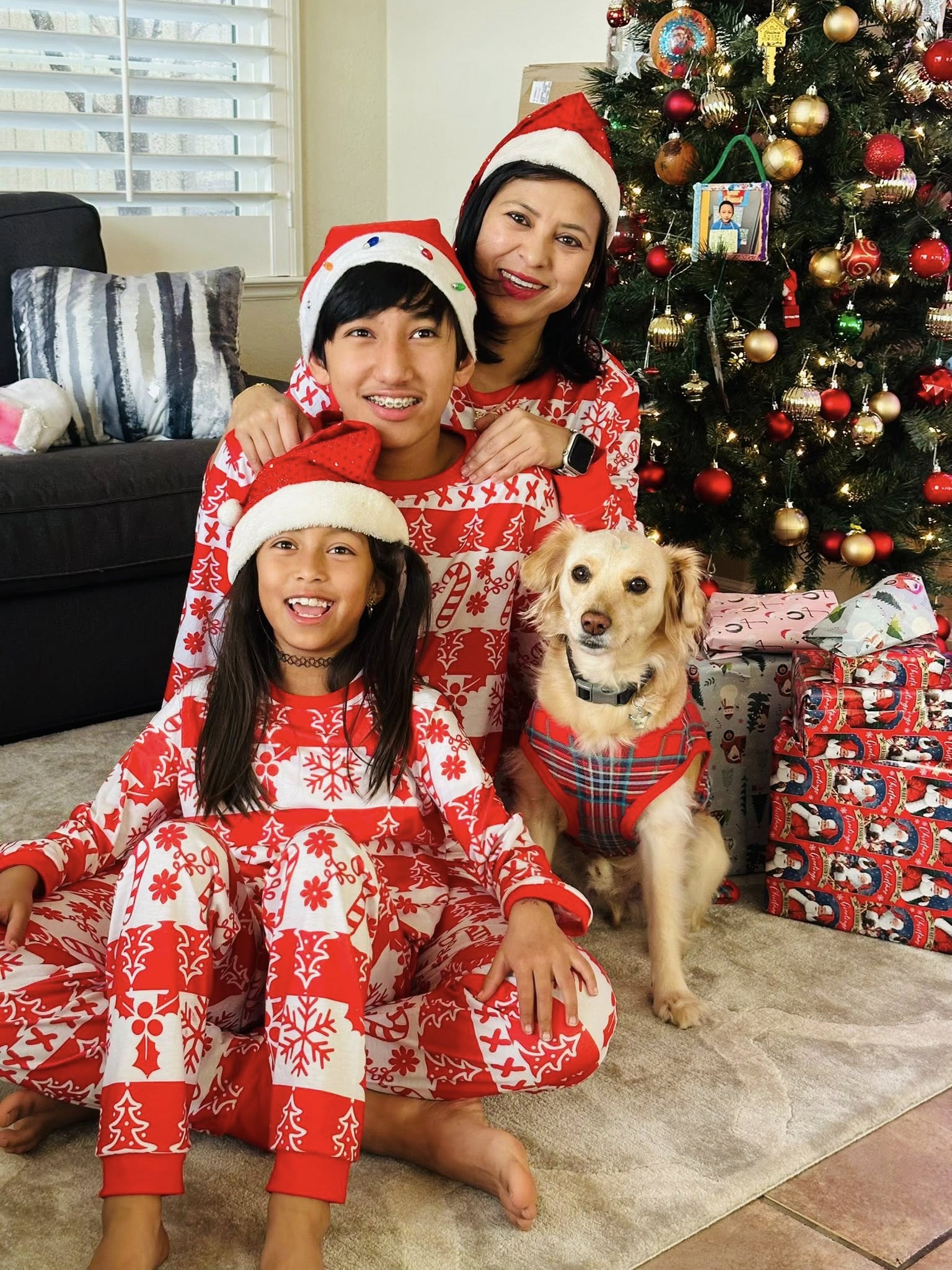 Miss Rasu with her children and Fluffy